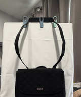 Vera Bradley Black Quilted Convertible Crossbody Backpack - Image 1