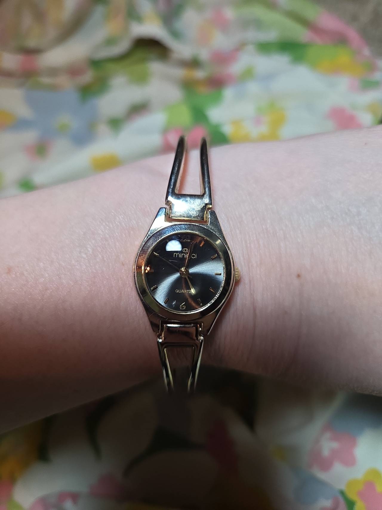 Minicci Gold Tone Bangle Watch