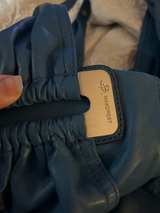 vibrant blue leather handbag, likely a shoulder bag  - Image 2