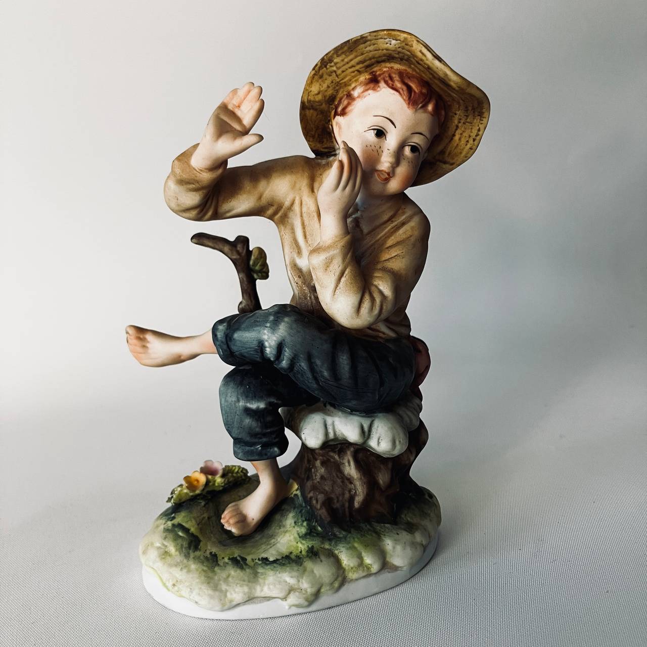 Porcelain Boy Figurine