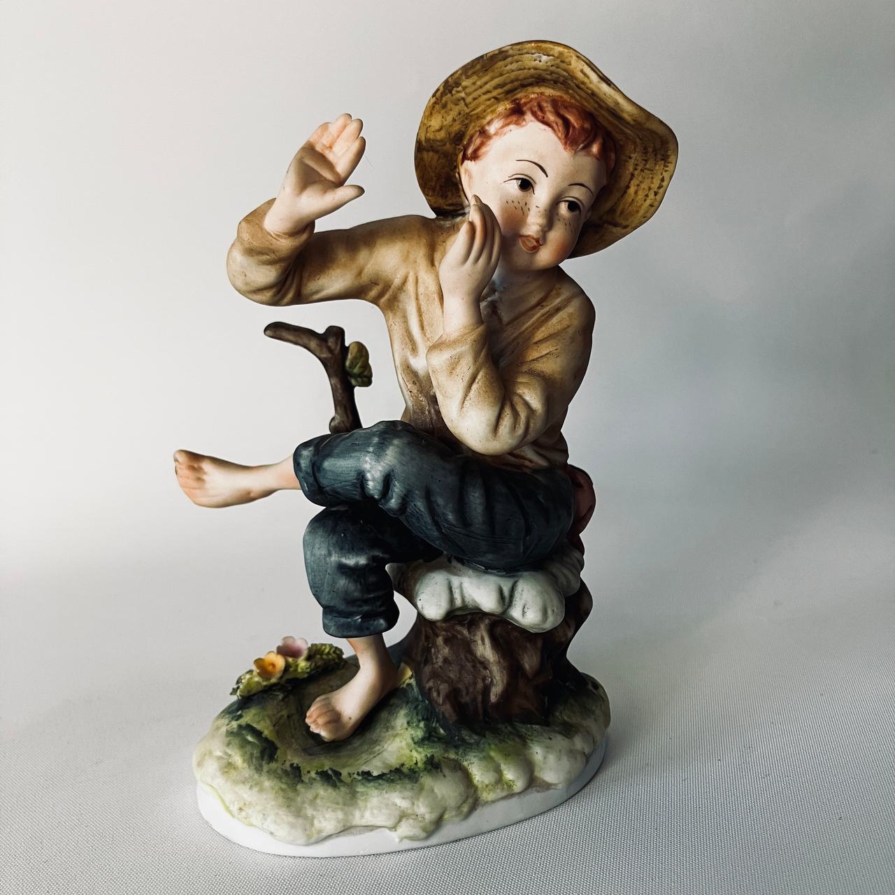 Porcelain Boy Figurine