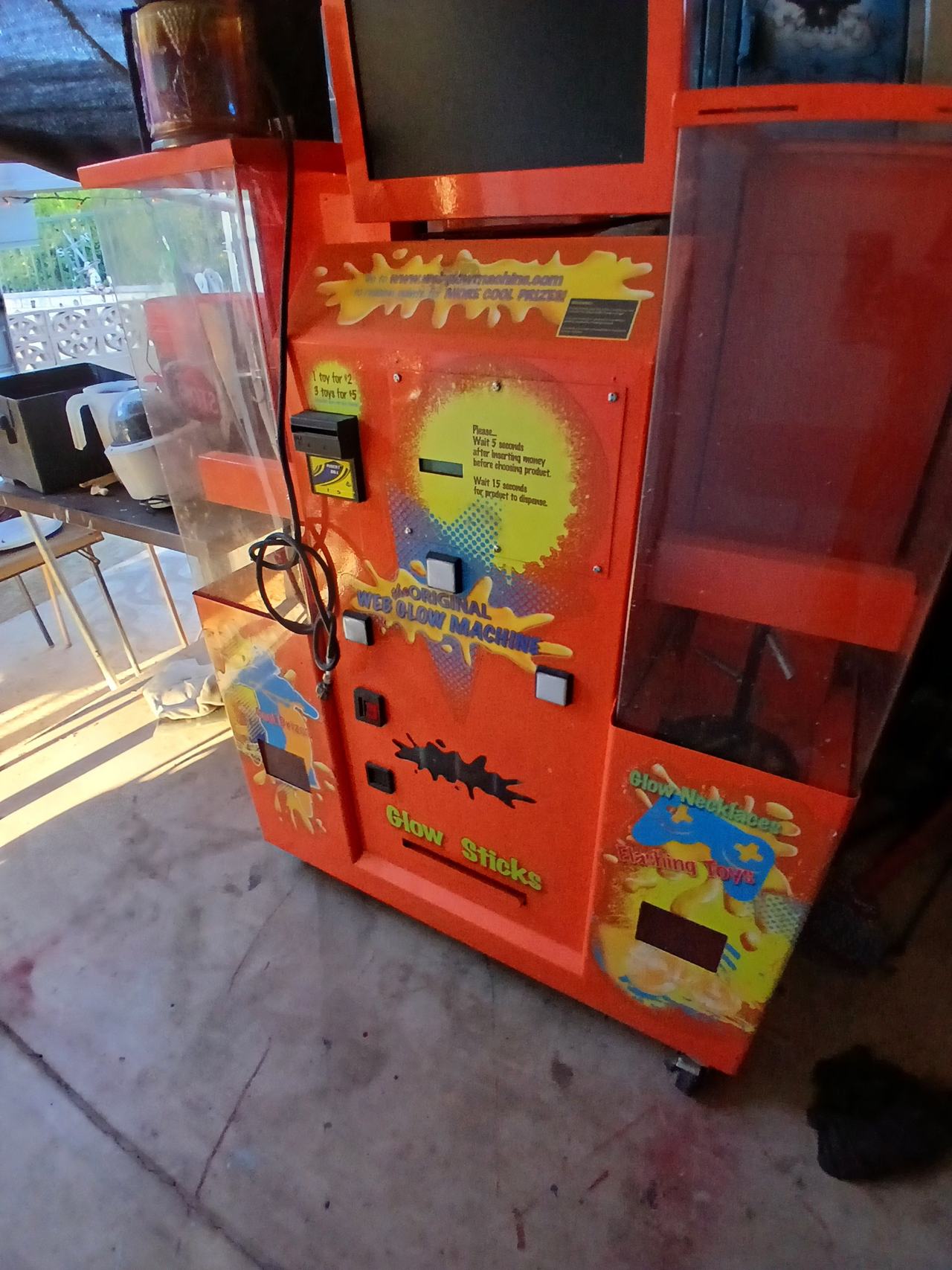 The Original Glow Machine Vending Cabinet