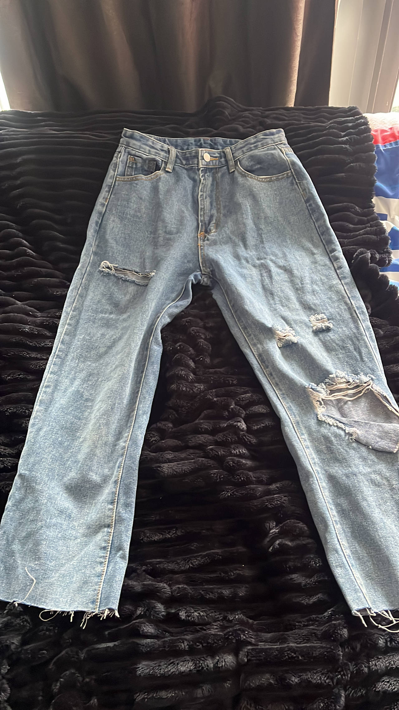Distressed Blue Jeans