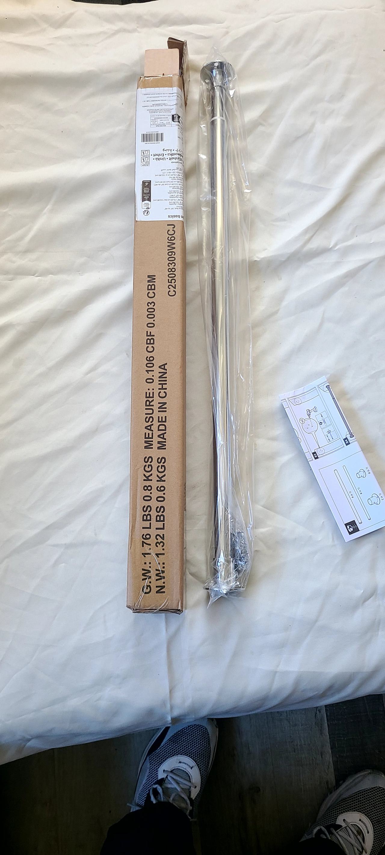 New Amazon V6 adjustable clothes hanging rod.