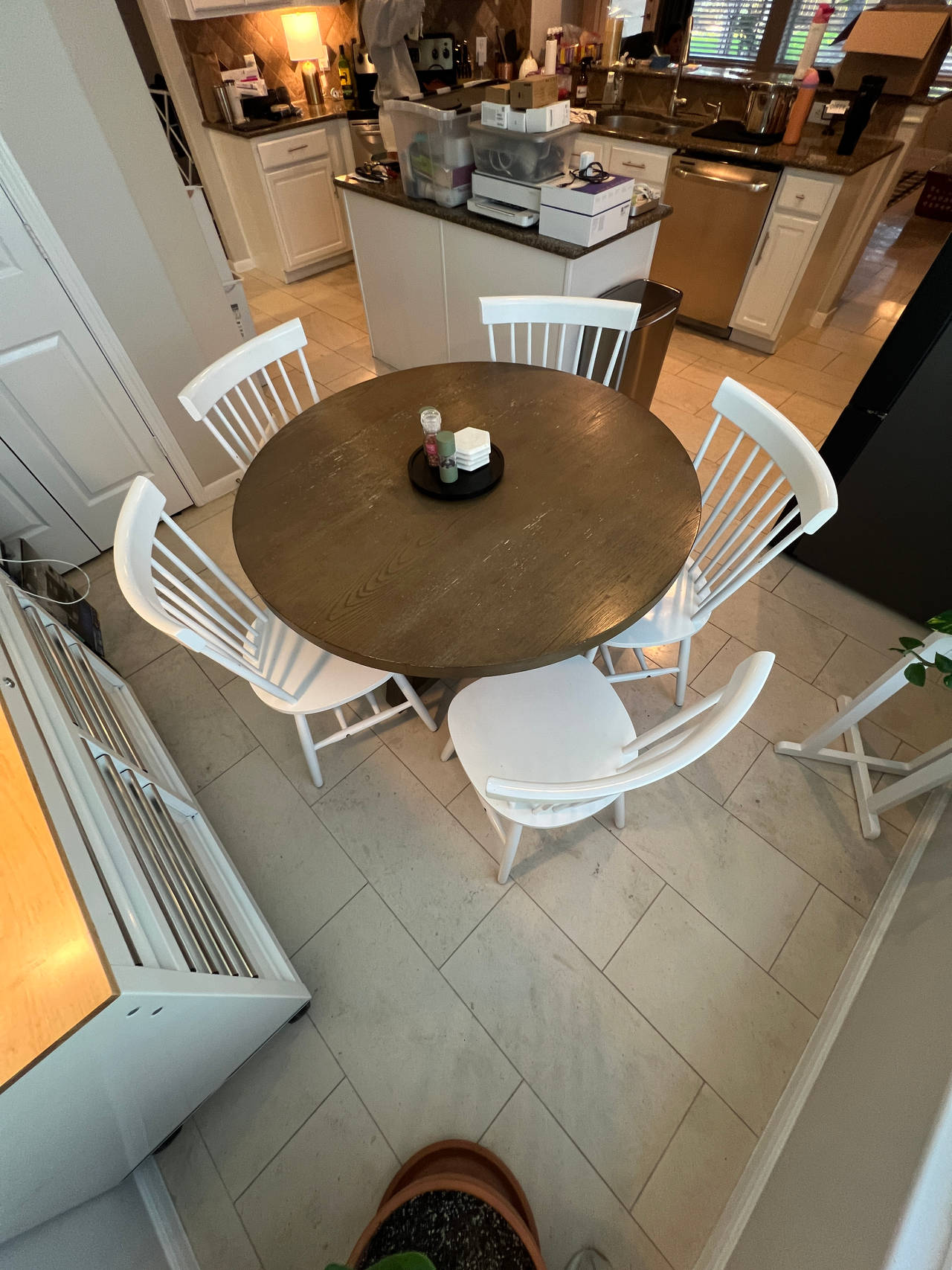 Living Spaces Round Wooden Dining Table with White Spindle Back Chairs