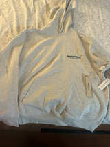 Fear of God Essentials Hoodie Light Oatmeal - Image 1