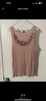 Sleeveless Blouse with Floral Neckline - Image 2