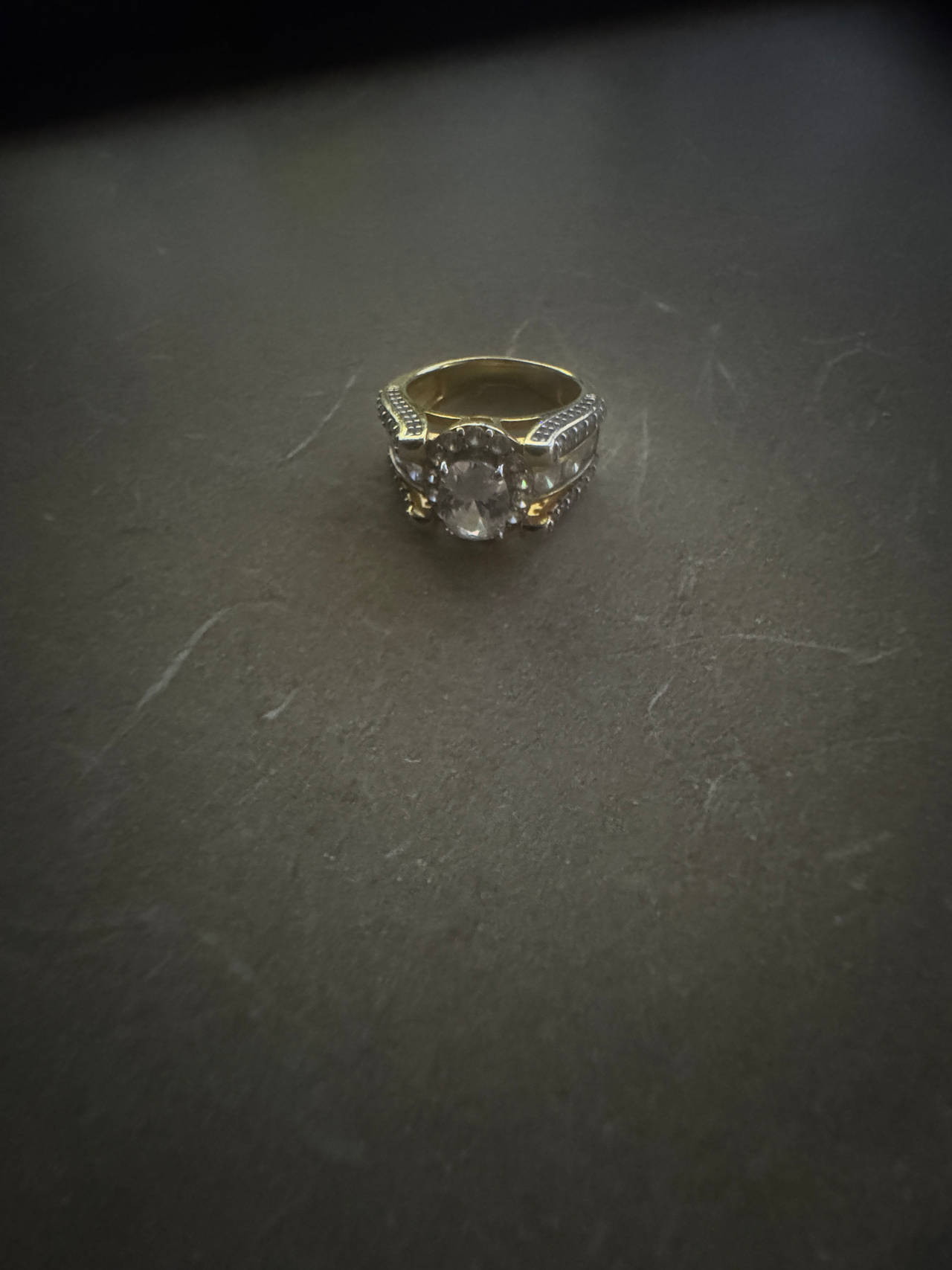 Gold Engagement Ring with Oval Center Stone