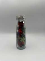Prima Got Flowers Christmas colors in glass milk bottle (discontinued) - Image 1