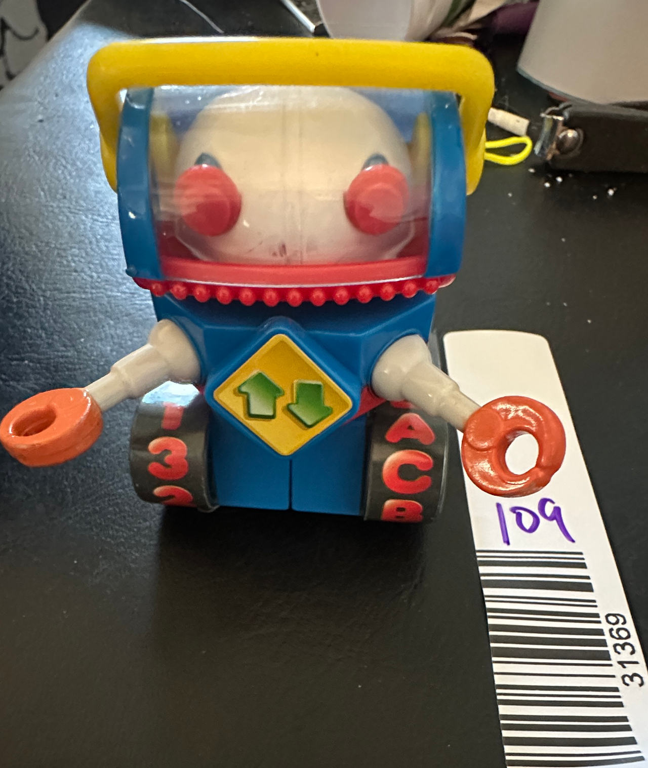 Retro robot figure red white blue yellow