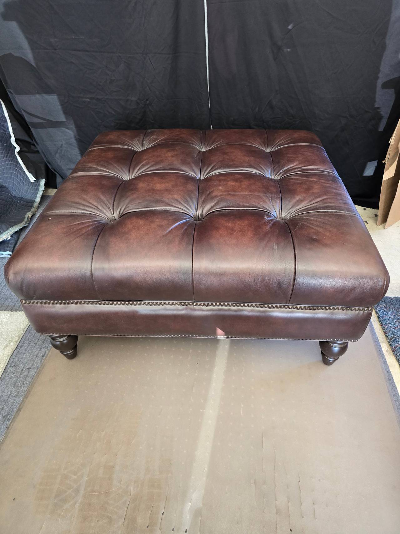 Tufted Leather Ottoman with Nailhead Trim