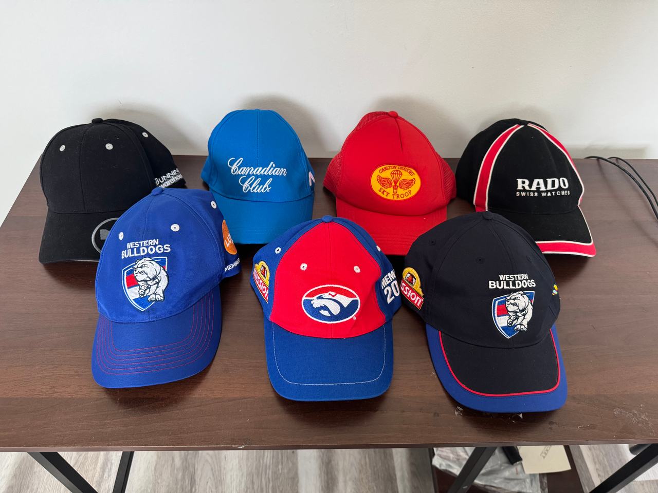 Bunch of different hats and beanies