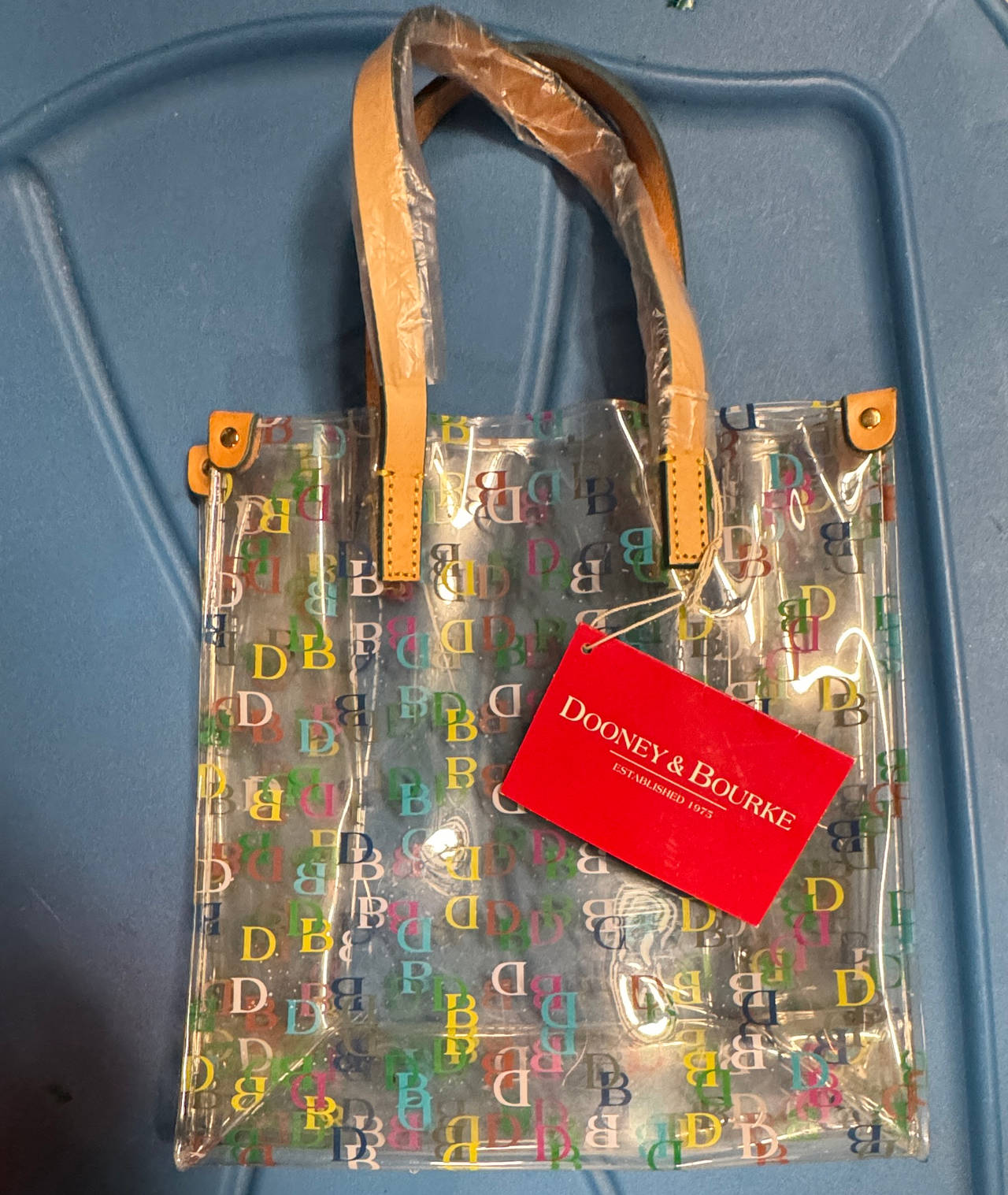 Dooney & Bourke Clear Multi-Color Logo Tote Bag