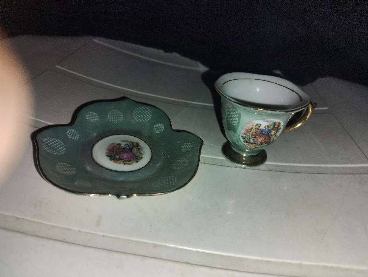 Vintage Miniature Porcelain Teacup and Saucer Set