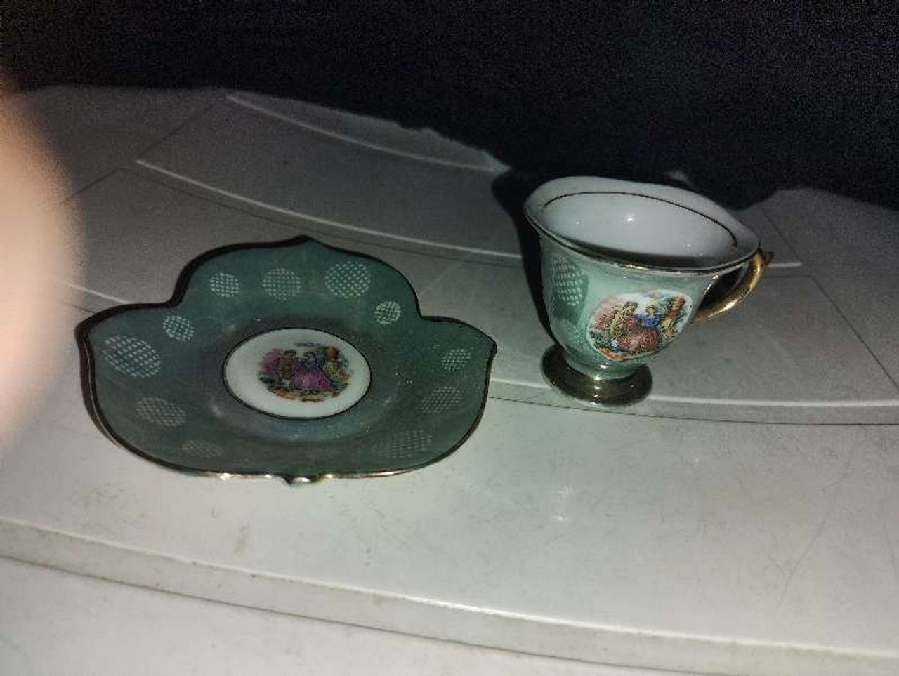Vintage Miniature Porcelain Teacup and Saucer Set