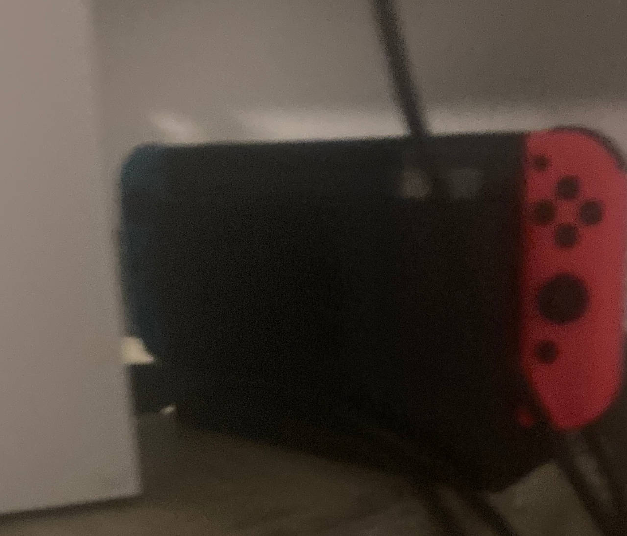 Nintendo Switch with Neon Blue and Neon Red Joy-Con