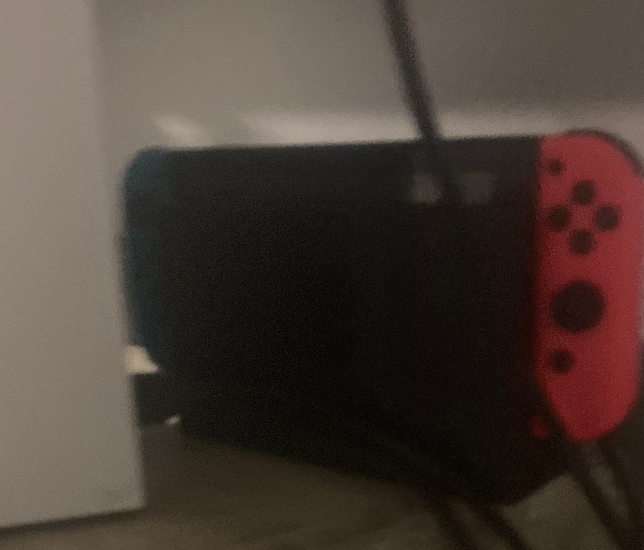 Nintendo Switch with Neon Blue and Neon Red Joy-Con