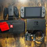 Nintendo Switch with Gray Joy-Con - Image 1