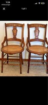 Antique Wood Dining Chairs with Cane Seats - Image 1