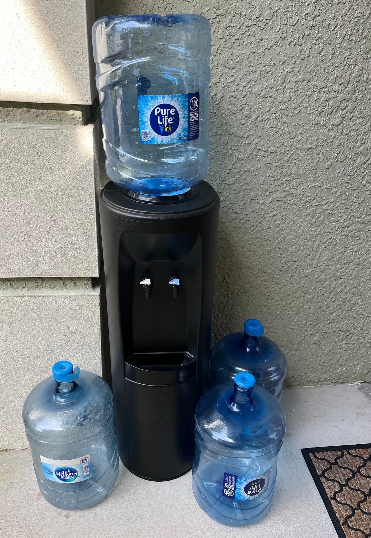 Water Dispenser 4 Empty 5 Gallon Bottles 
