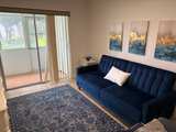 FULL ROOM DECOR-  Includes Navy Blue Velvet Tufted Sofa bed , rug , art , chair - Image 3