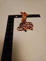 Ceramic Sitting Giraffe Figurine - Image 1
