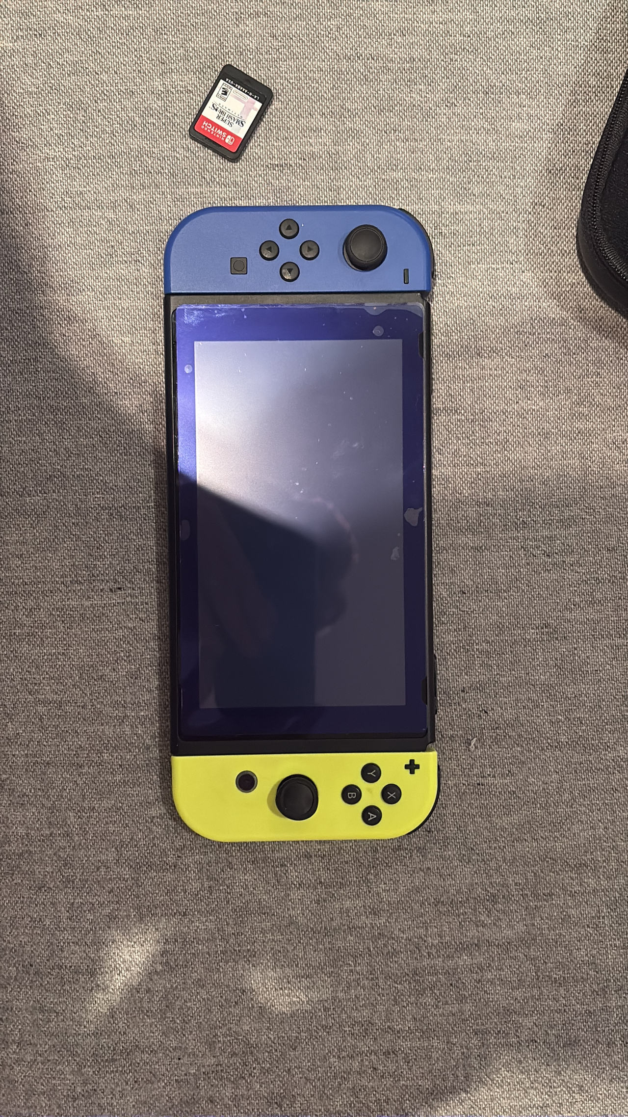 Nintendo Switch with Neon Blue and Neon Yellow Joy-Con