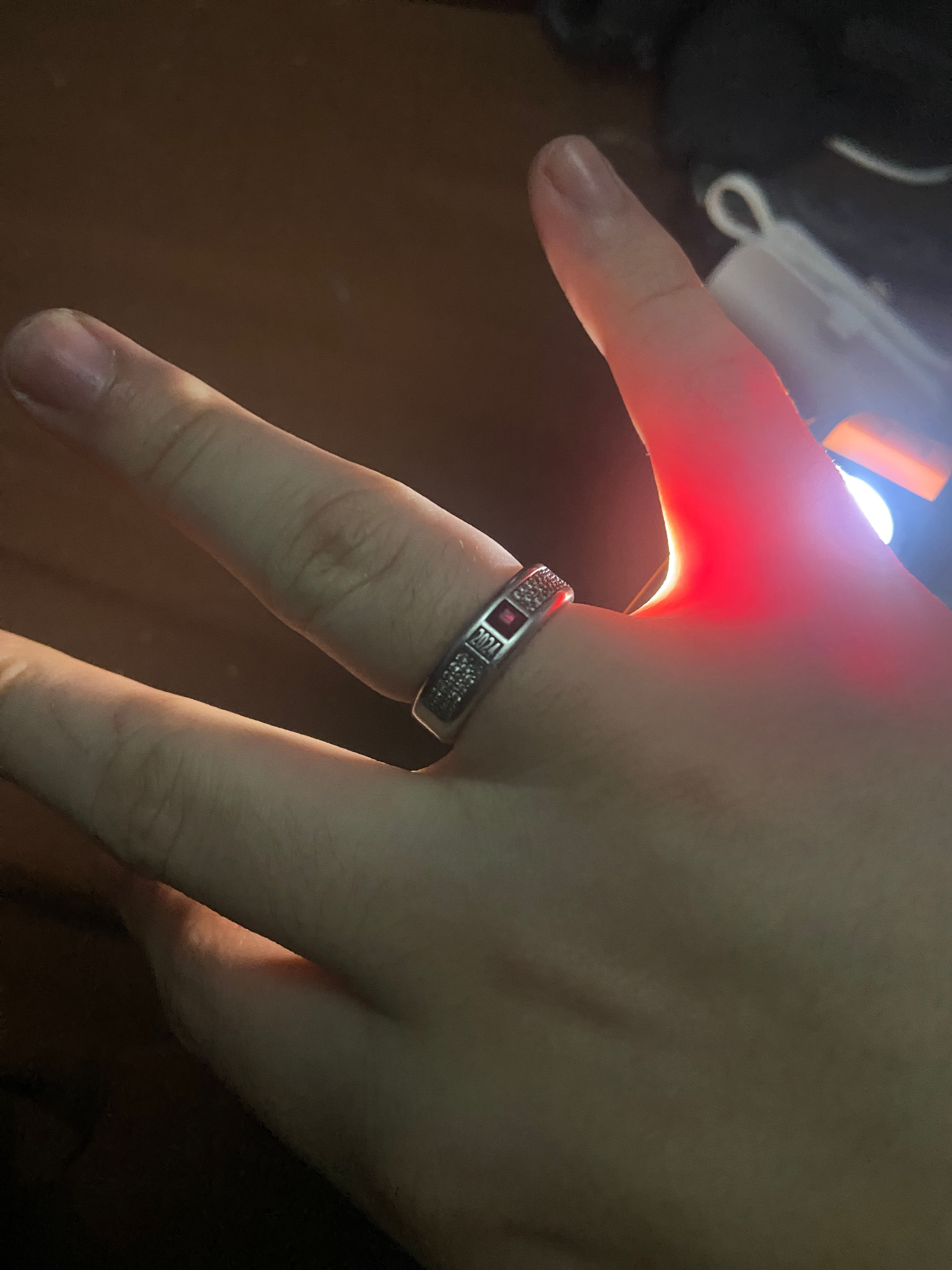 Class ring 10k white gold antique with Ruby gem, and two sides sets of diamond