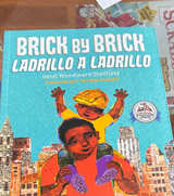 Brick by Brick / Ladrillo a Ladrillo by Heidi Woodward Sheffield - Image 1