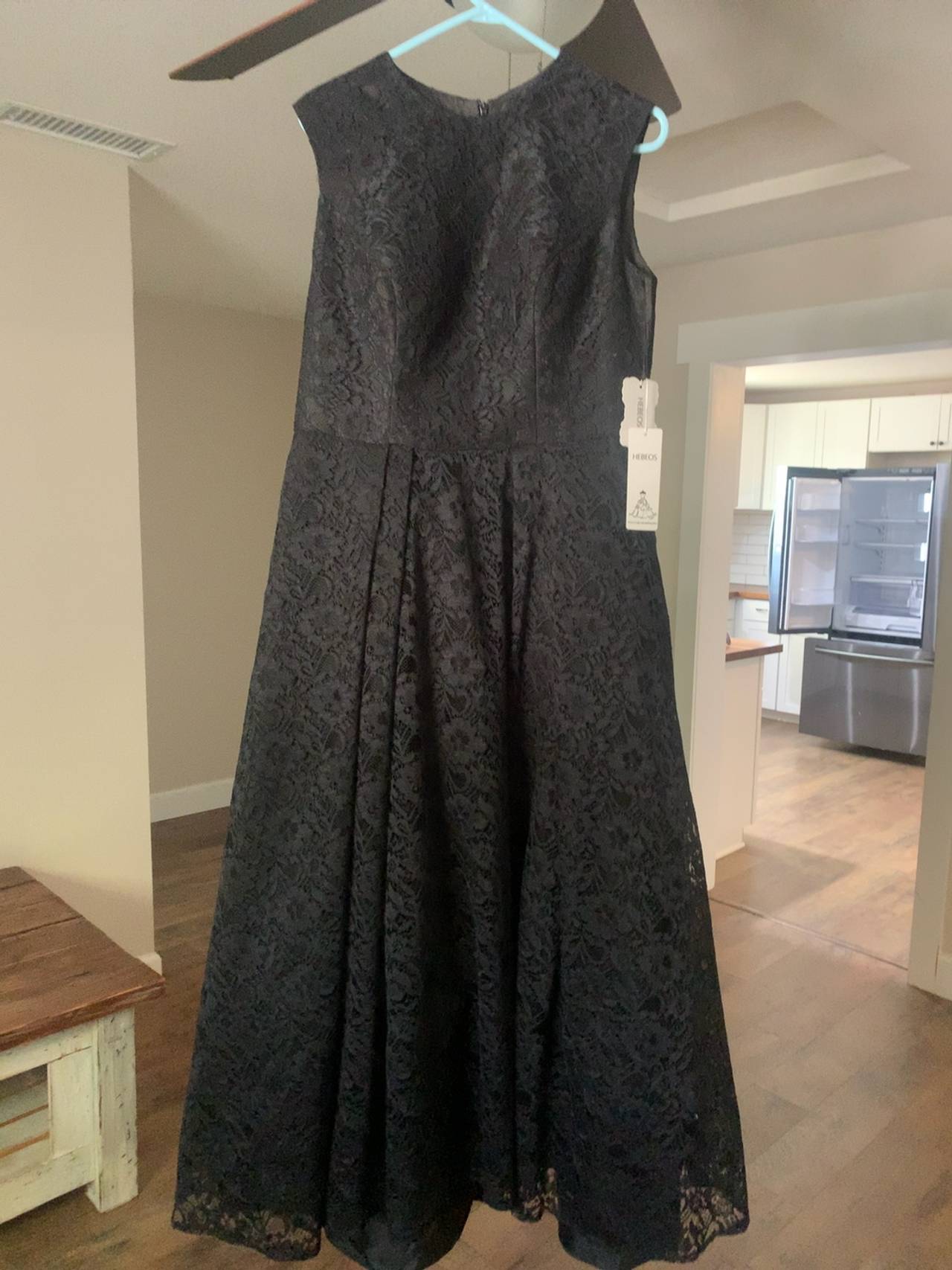 Lace formal new, ordered for a wedding and it was too long for me.  Size 14