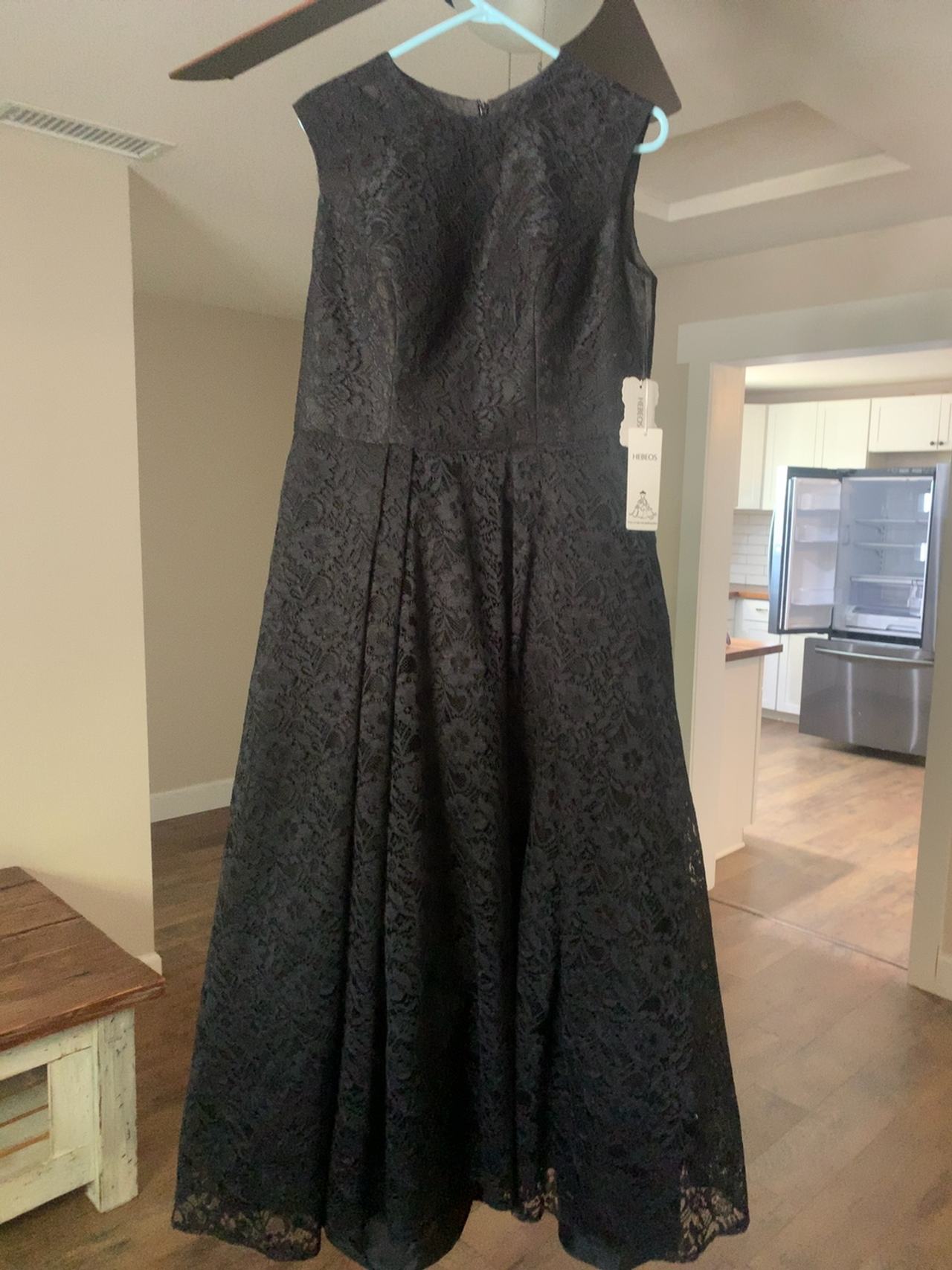 Lace formal new, ordered for a wedding and it was too long for me.  Size 14