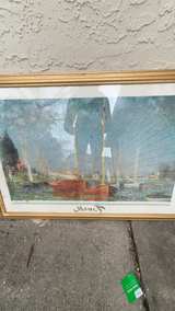 Claude Monet Red Boats at Argenteuil Framed Canvas Art Print - Image 1