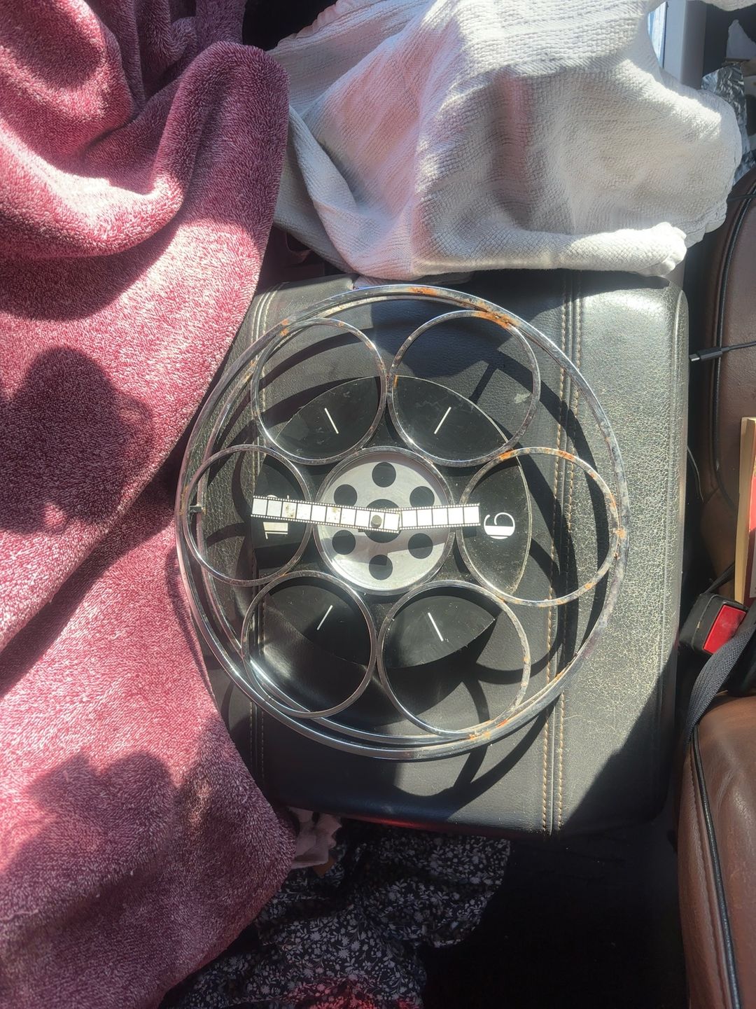 Home Theater Mart Film Reel Wine Rack Black Base Chrome