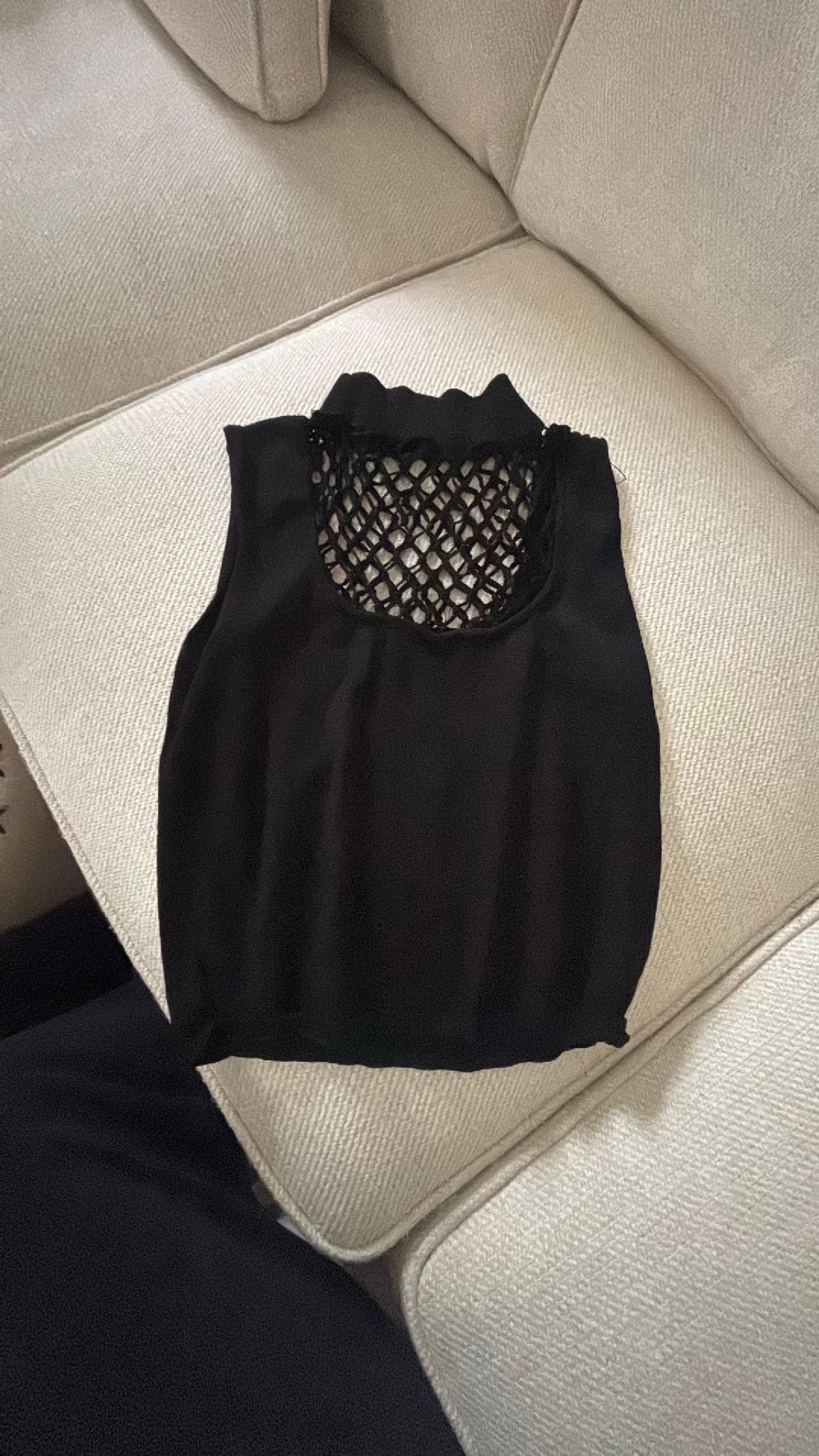 STAUD Sleeveless Mock Neck Knit Top with Crochet Detailing