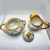 Jean Pouyat (JP) & France Limoges
Hand-Painted Sugar Bowl and Creamer Set - Image 1