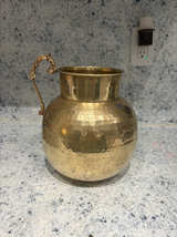 Vintage Hammered Brass Pitcher with Ornate Handle - Image 1