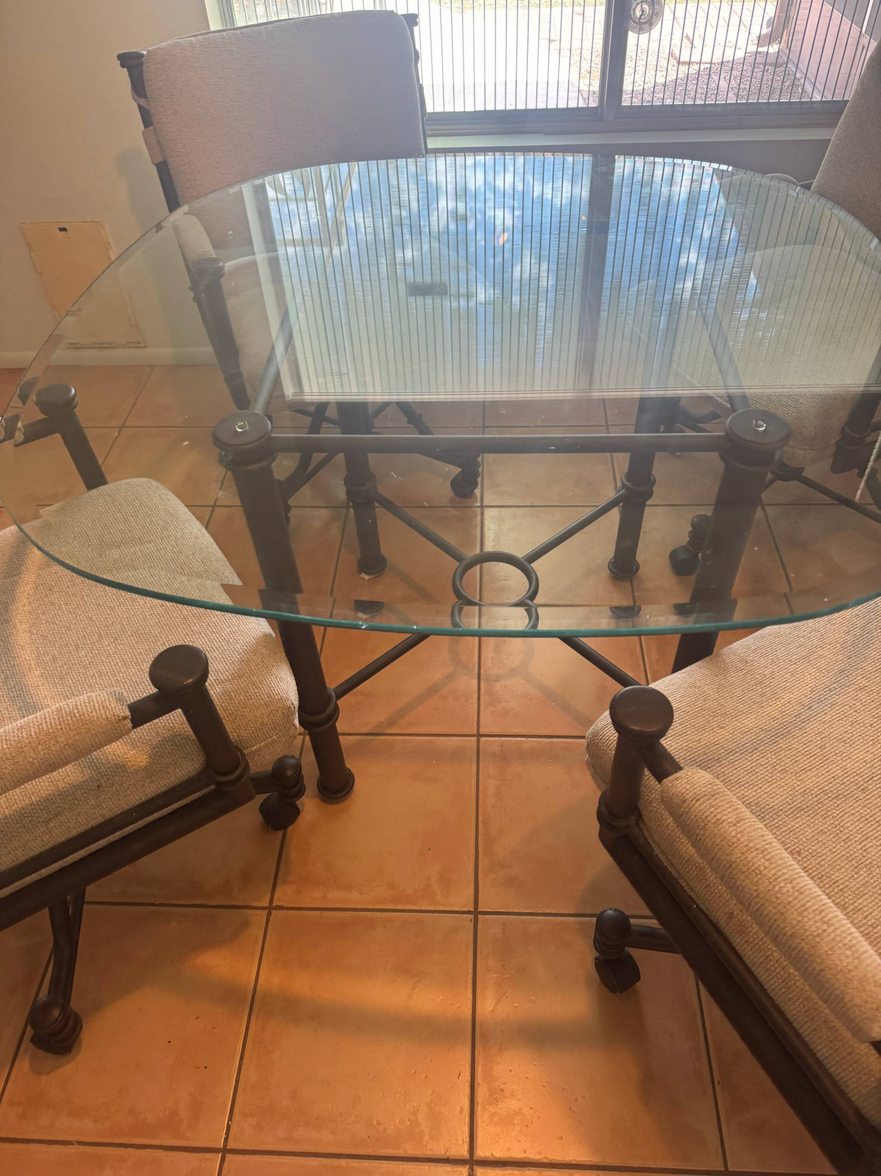 Glass Top Dining Table with Upholstered Chairs