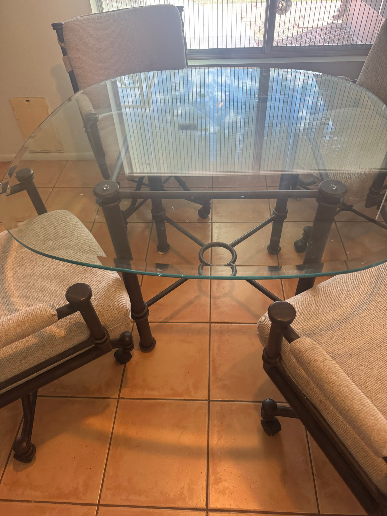 Glass Top Dining Table with Upholstered Chairs