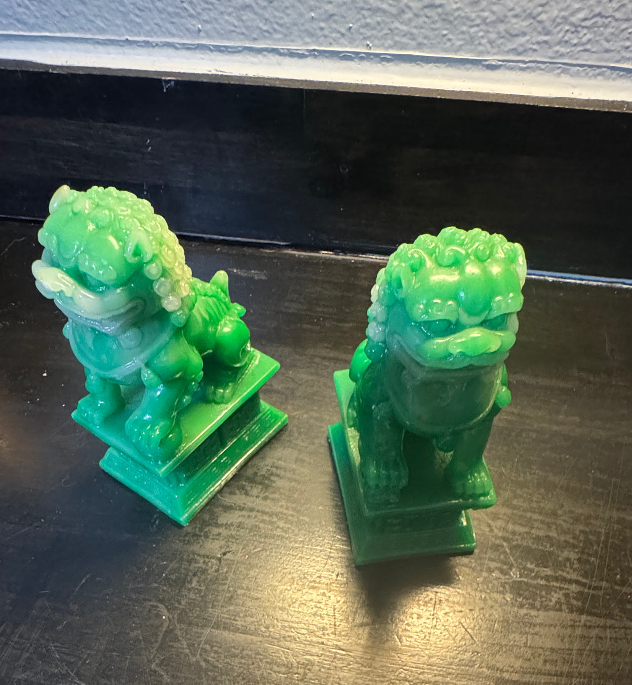Pair of Green Resin Foo Dog Statues