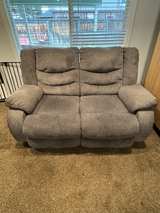 Ashley Tulen Reclining Loveseat Gray Fabric - Image 1