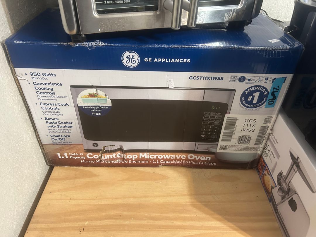 GE 1.1 Cu. Ft. Countertop Microwave Oven in Stainless Steel