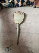 Vintage Gold Tone Victorian Style Hand Held Vanity Mirror with Floral Back - Image 1