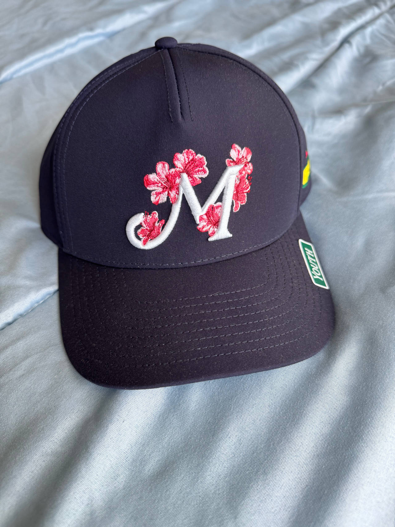 Melin A-Game Hydro Youth Floral M Hat Navy Blue Azalea