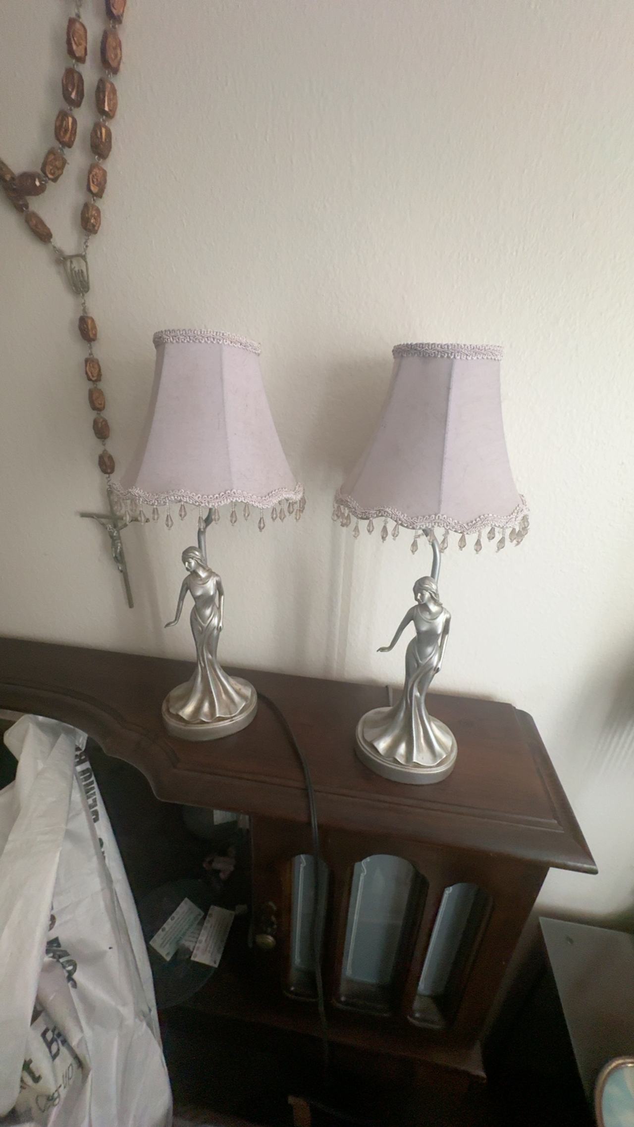 Silver Colored Woman in Dress Silhouette Sculpture and Light Purple Lampshade