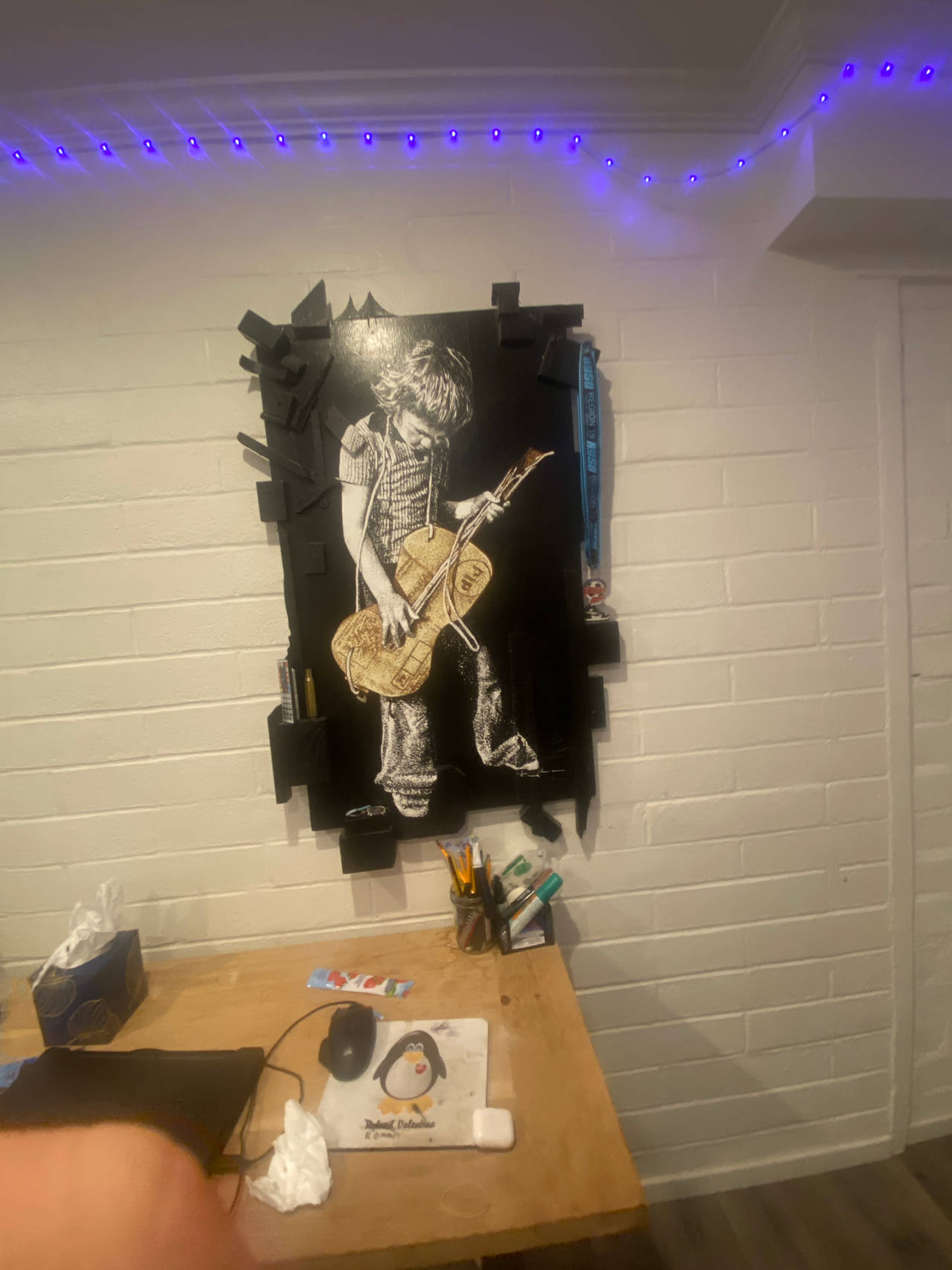 Wall Art of Child Playing Guitar