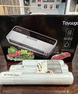 NEW Toyuugo Vacuum Sealer Machine with Starter Kit and Extra Rolls - Image 1