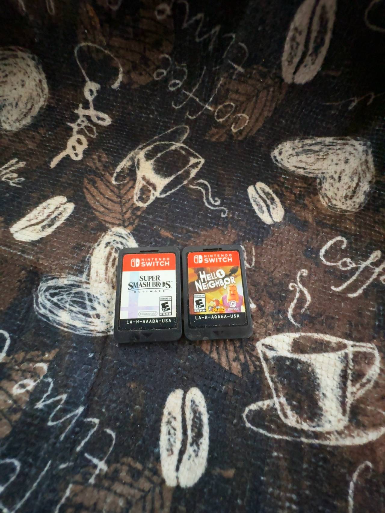 Nintendo Switch Hello Neighbor and super smash bros cartridge.