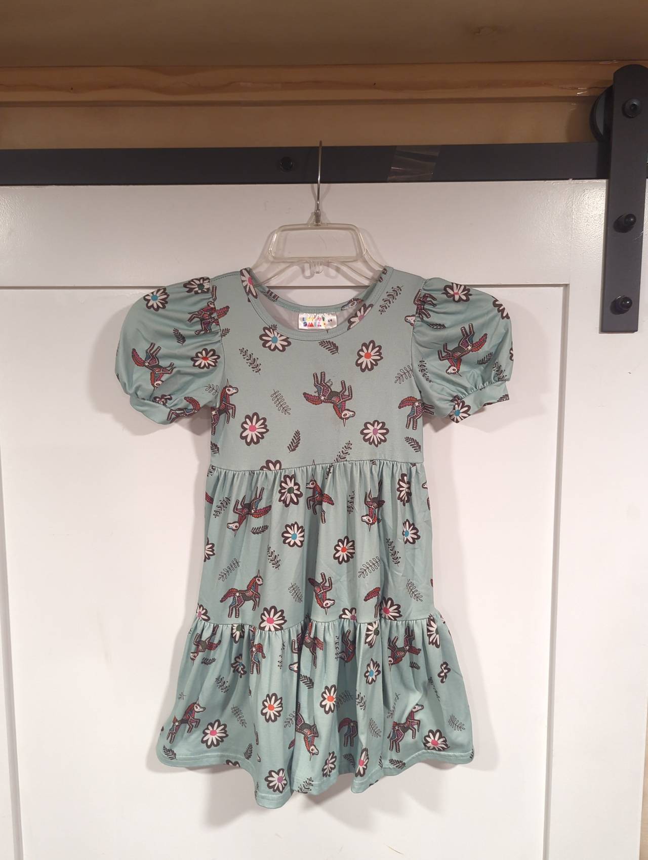 DotDotSmile Tiered Dress. unicorn skeleton