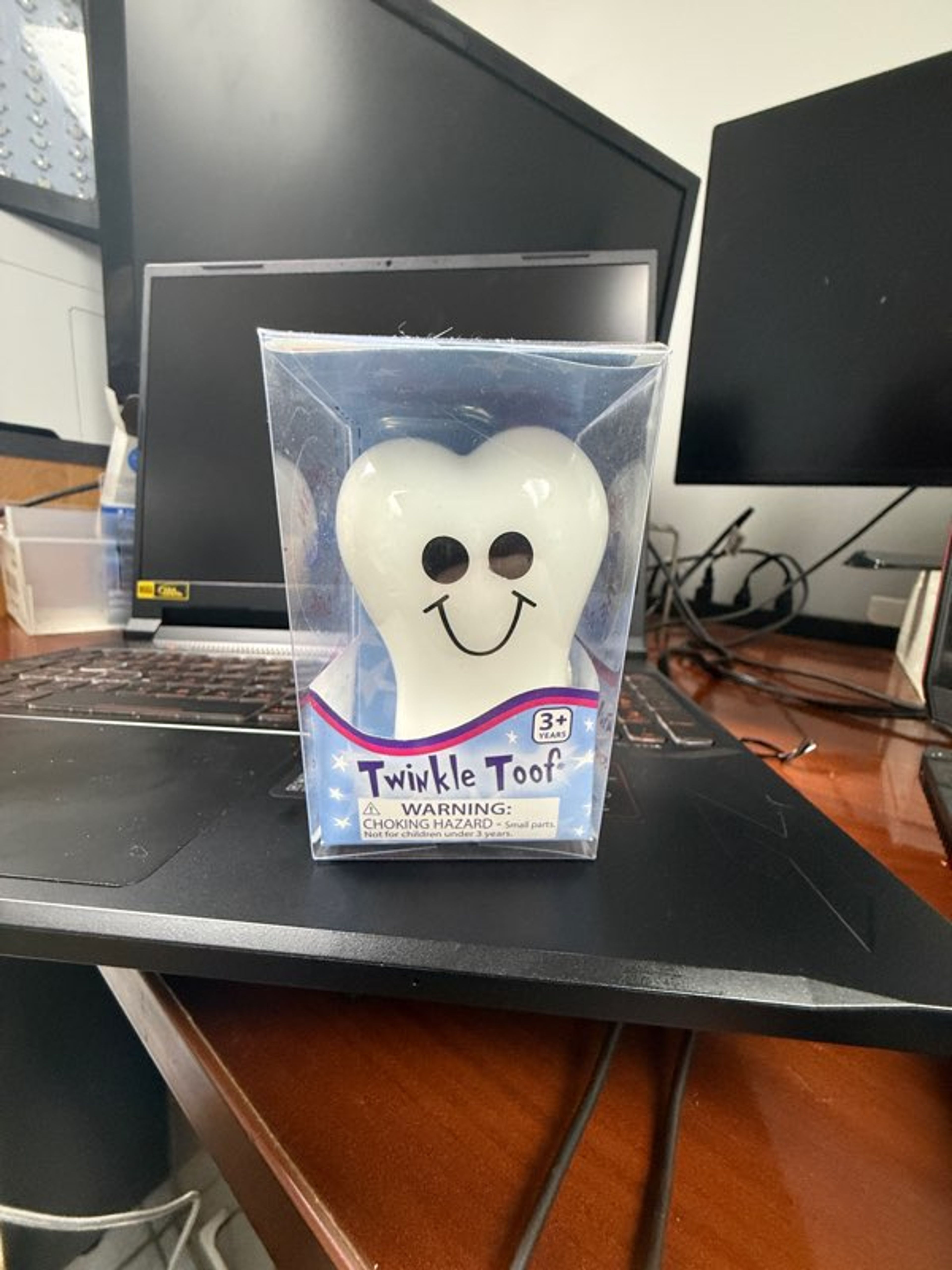 Twinkle Toof tooth fairy  tooth holder. glows in the dark.