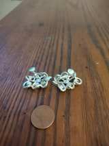 Vintage Silver-Tone Rhinestone Swirl Clip-on Earrings - Image 1